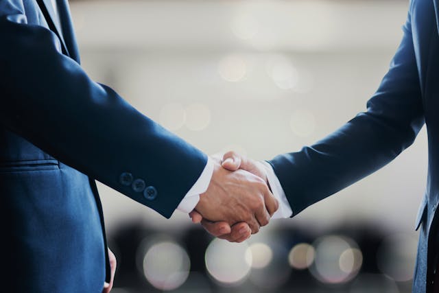 business professionals shaking hands